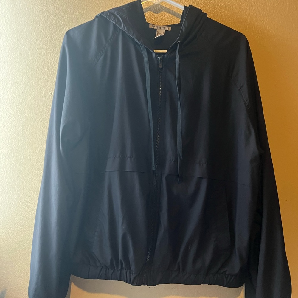Black windbreaker